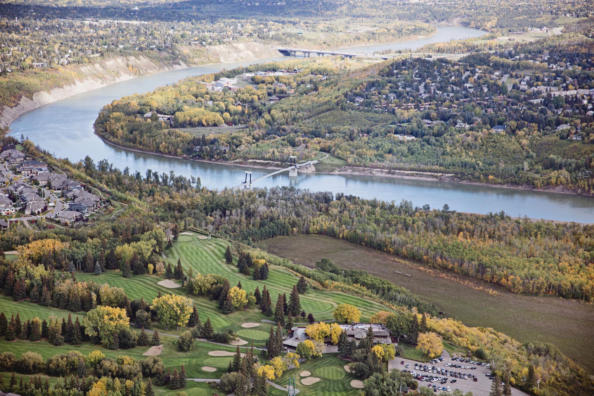 Arial photo of river with surrounding trees and land