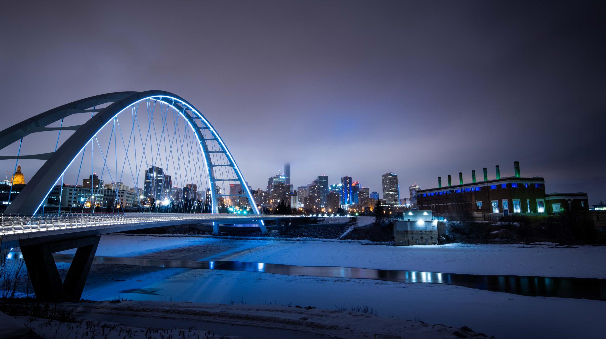 Walterdale Bridge at night with the downtown skyline behind