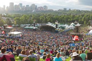 Fans enjoying the Edmonton Folk Music Festival, which is held in August in Gallagher Park in the river valley. 