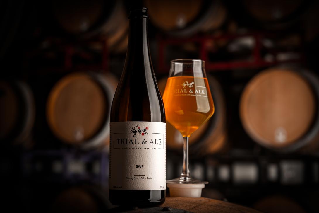 A bottle and glass of one of Trial & Ale’s sour and wild artisanal ales