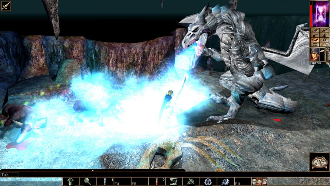 An animated dragon breathes ice on a kneeling man with a staff. 