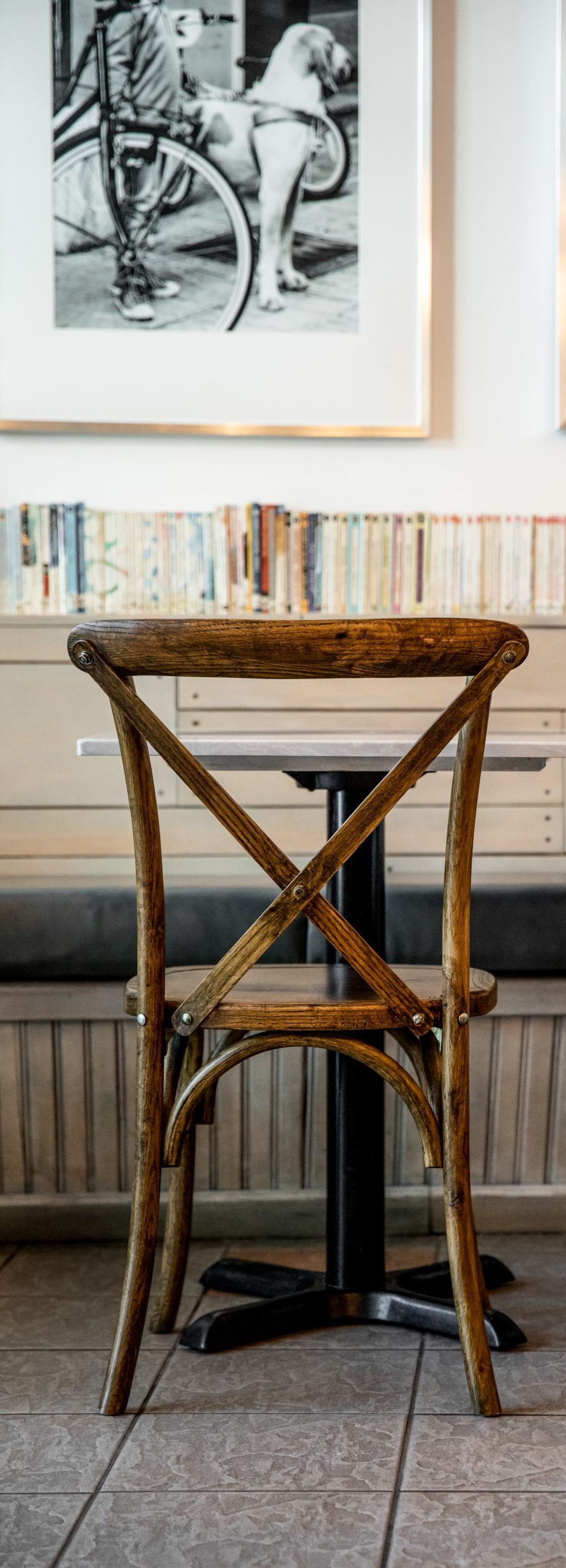 Tables, chairs and decorations inside restaurant Cafe Bicyclette.