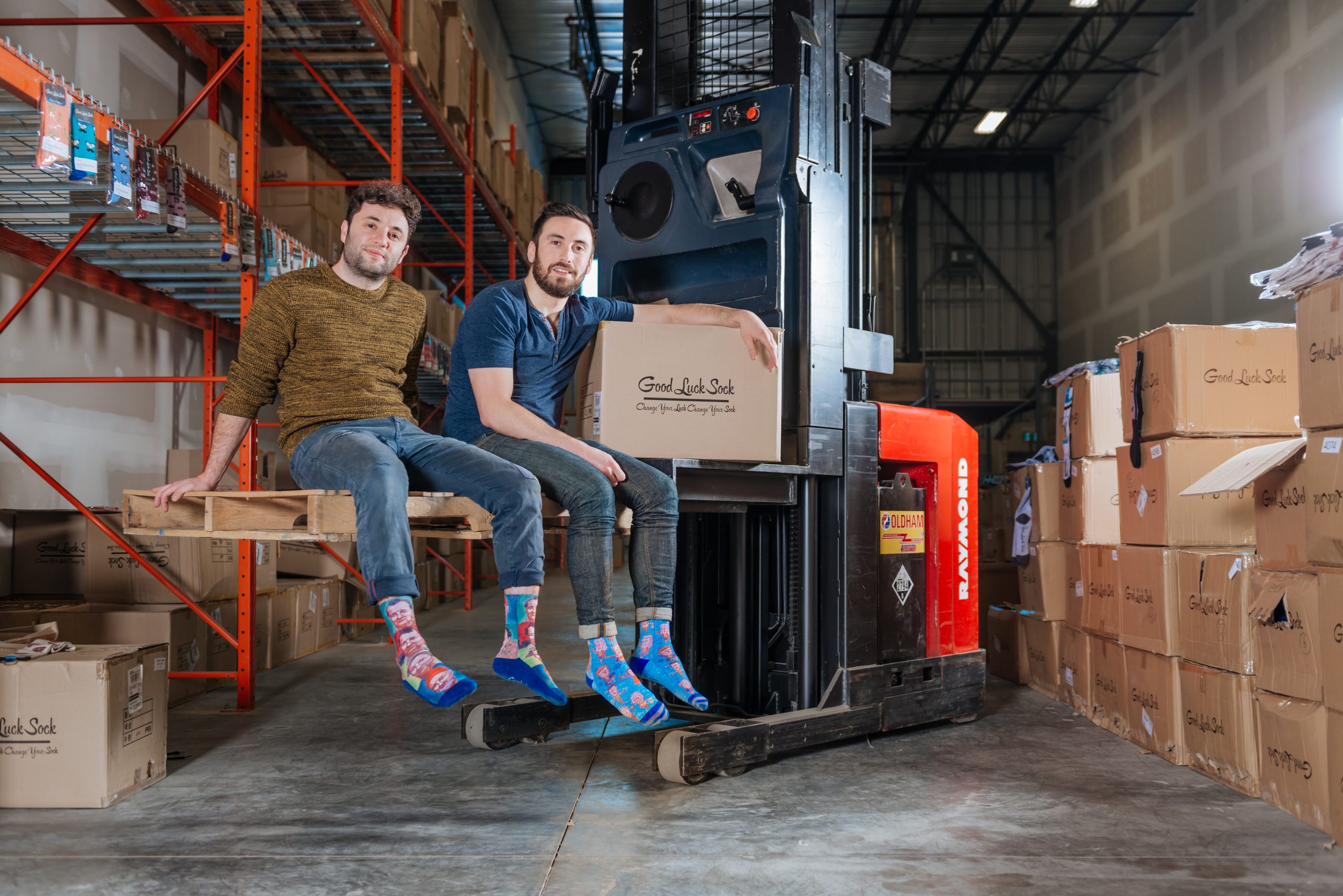 Staff in warehouse of local business, Good Luck Sock