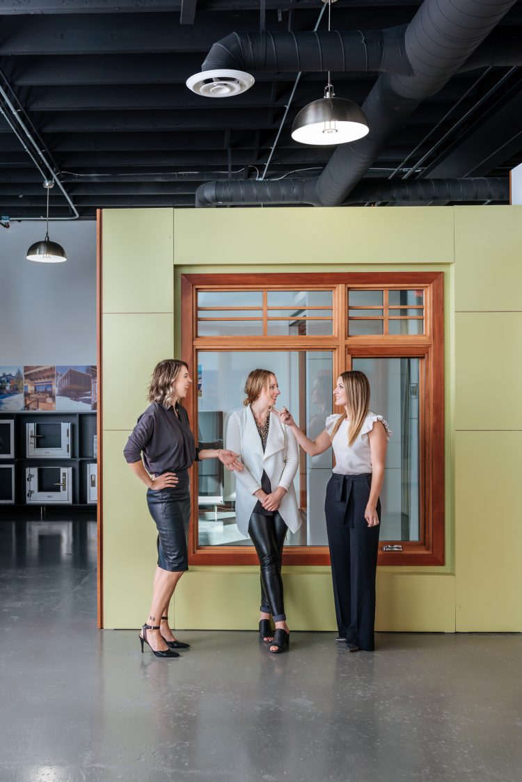 Staff standing in showroom in local business, RSVP Design