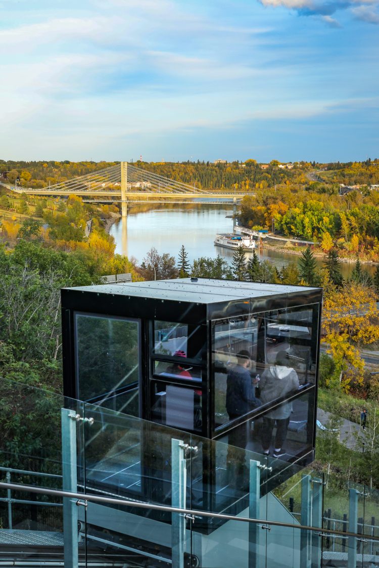 Guests inside the 100 Street Funicular in fall