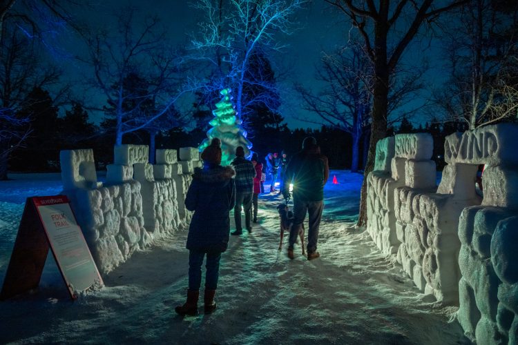 Guests walking along the Folk Trail made with ice walls