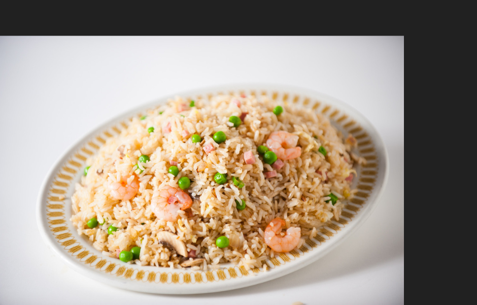 Special fried rice with shrimp presented on a plate.