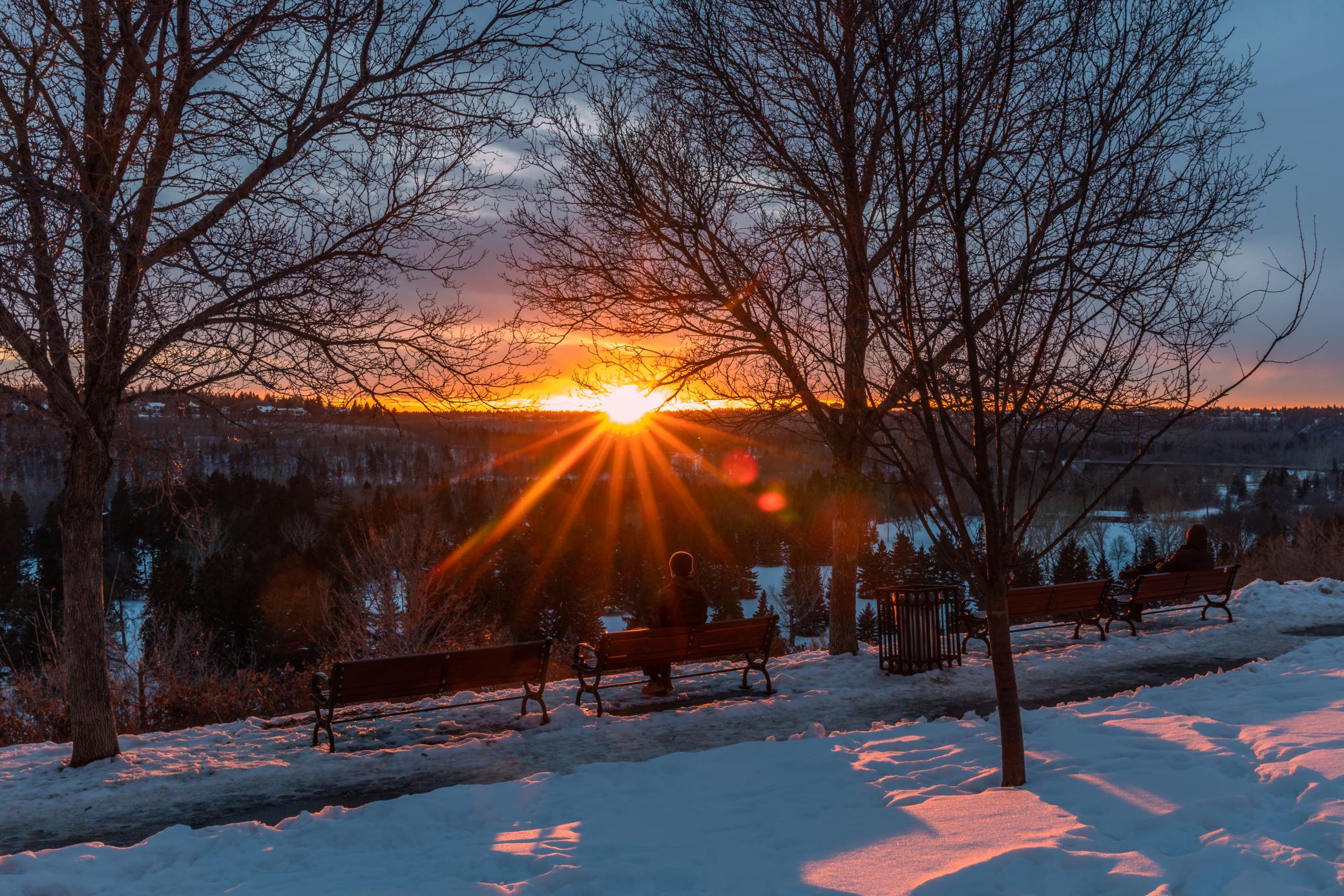 the winter sunset at the victoria promenade overlook in the Oliver neighbourhood looking down the river valley
